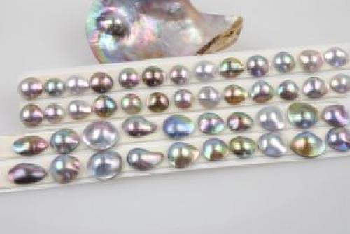 Как отличить жемчуг морской от речного. Как отличить морской жемчуг от речного